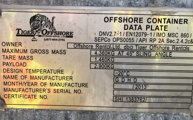 Engraved metal data plate on an offshore shipping container